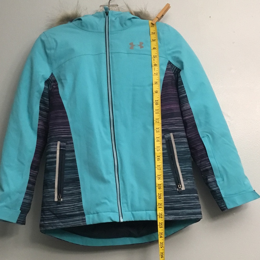 Under ARMOUR Kids jacket.